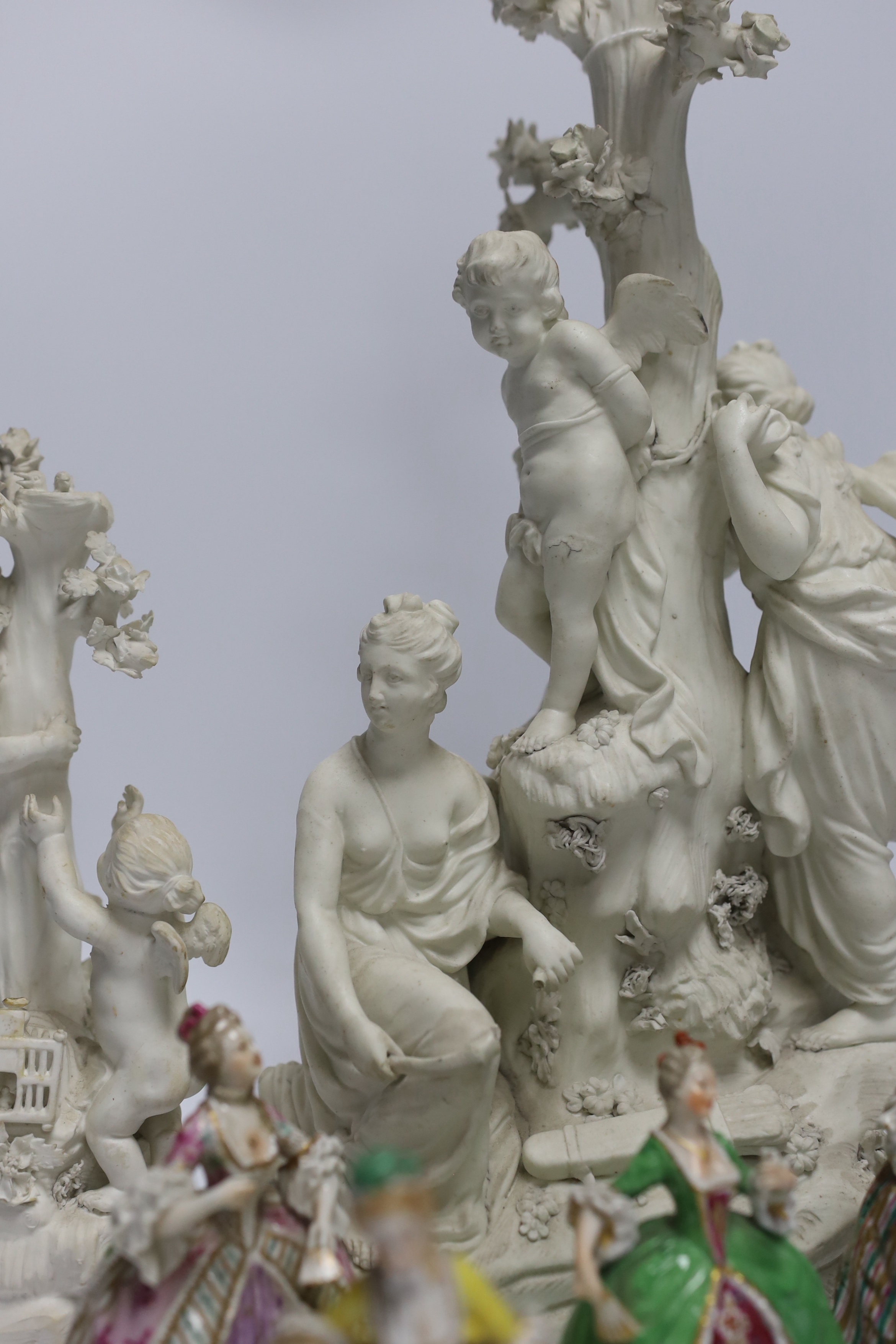 Two late 18th century biscuit figural centrepieces, six figurines and another, tallest 40cm